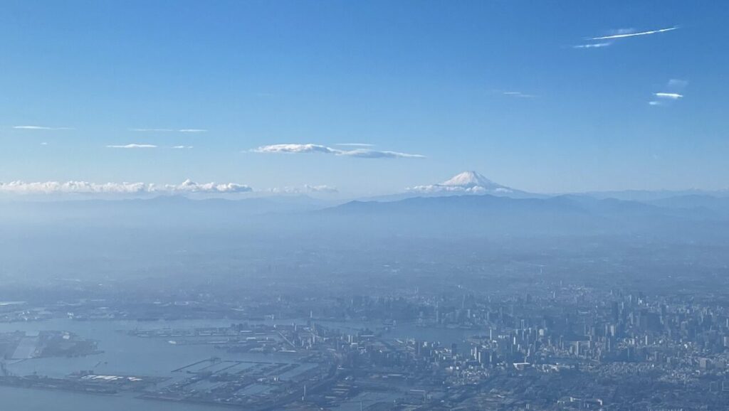 ANA110便ニューヨーク行きの機内から見る東京と富士山