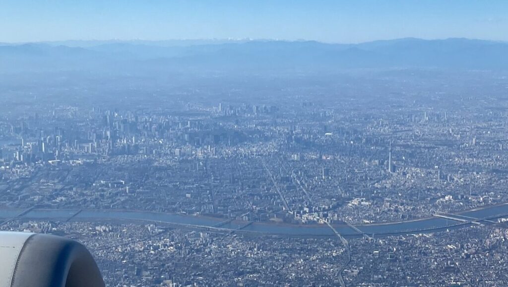 ANA110便ニューヨーク行きの機内から眺める東京都心部
